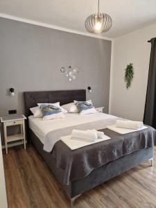 Postel nebo postele na pokoji v ubytování Apartments Jadranka