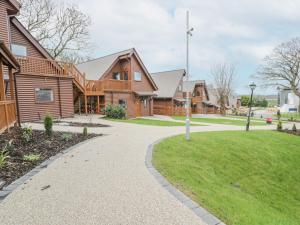 a walkway in front of a house at Luxury Lodge 69 in Rhyl