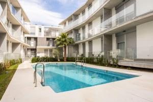 Bazén v ubytování Viento Grande, Apartamento boutique en la playa nebo v jeho okolí + 18 fotografií