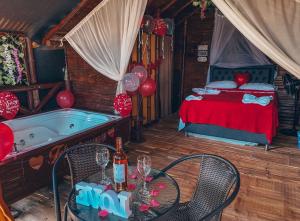 Postel nebo postele na pokoji v ubytování Glamping Mirador Santa Fe-Sopetran