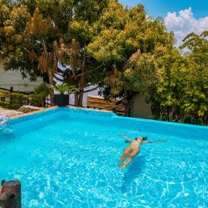 Bazén v ubytování Glamping Mirador Santa Fe-Sopetran nebo v jeho okolí