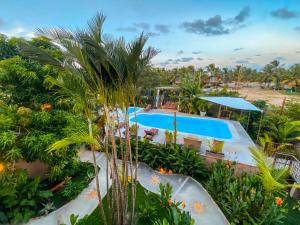 a view of the pool at the resort at Pousada Brisas de Sagi in Baía Formosa