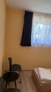 Postel nebo postele na pokoji v ubytování Manuela Ifjúsági Hotel
