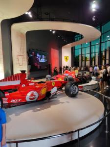 a red race car on display in a museum at Beautiful apartment with swimming-pool in Salou