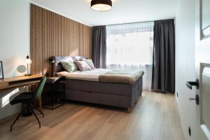 Voodi või voodid majutusasutuse Trendy apartment in Haapsalu center toas