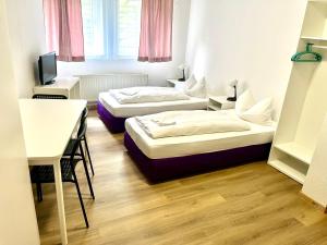 Postel nebo postele na pokoji v ubytování Hotel Garni Am Schäfersberg