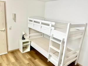 Postel nebo postele na pokoji v ubytování Hotel Garni Am Schäfersberg
