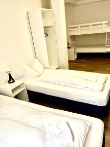Postel nebo postele na pokoji v ubytování Hotel Garni Am Schäfersberg