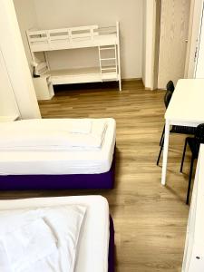 Postel nebo postele na pokoji v ubytování Hotel Garni Am Schäfersberg