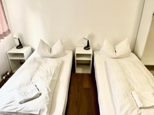 Postel nebo postele na pokoji v ubytování Hotel Garni Am Schäfersberg