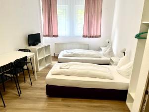 Postel nebo postele na pokoji v ubytování Hotel Garni Am Schäfersberg