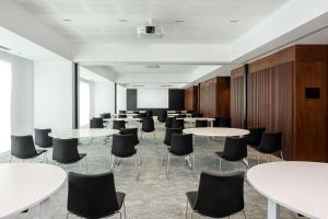 a conference room with tables and chairs at Radisson Hotel Tunis, City Center in Tunis