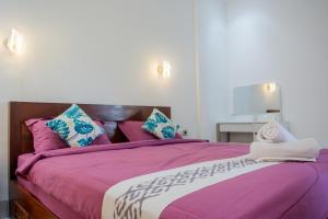 Voodi või voodid majutusasutuse Turtle House Lombok toas