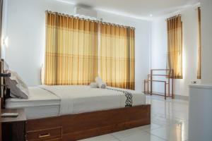 Voodi või voodid majutusasutuse Turtle House Lombok toas