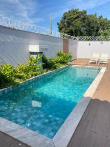 Πισίνα στο ή κοντά στο Aconchego! Sua casa com Piscina em Passos!!