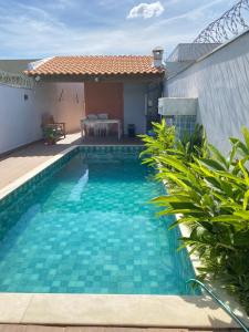 Πισίνα στο ή κοντά στο Aconchego! Sua casa com Piscina em Passos!!