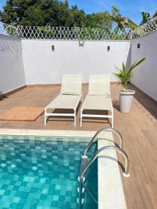 Πισίνα στο ή κοντά στο Aconchego! Sua casa com Piscina em Passos!!