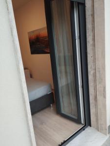 Postel nebo postele na pokoji v ubytování Bilocale per 2 - Quadrilocale per 6 - Appartamenti Sebastiani centralissimi