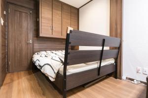 a bedroom with a bunk bed in a room at Kyoto - apartment / Vacation STAY 168 in Kyoto