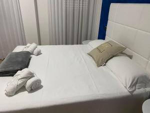Postel nebo postele na pokoji v ubytování Hotel Hc Resort Lignano