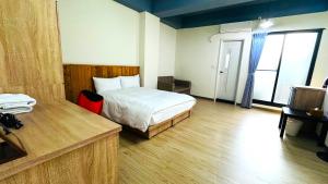 Ένα ή περισσότερα κρεβάτια σε δωμάτιο στο Didi House
