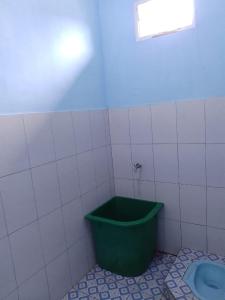 Koupelna v ubytování Simbolon Homestay Samosir