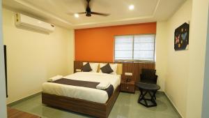 Hotel Hive Inn - Kozhikode客房内的一张或多张床位