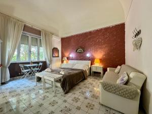 Postel nebo postele na pokoji v ubytování Aedes B&B Il Giardino dei Sogni
