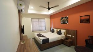 Hotel Hive Inn - Kozhikode客房内的一张或多张床位