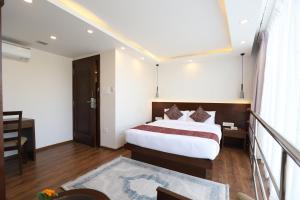 Tempat tidur dalam kamar di Apex Business Hotel - Tribhuvan International Airport, Kathmandu