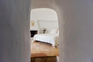 Posteľ alebo postele v izbe v ubytovaní Can Quince Balafia Ibiza Hotel - Turismo de Interior