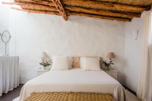 Posteľ alebo postele v izbe v ubytovaní Can Quince Balafia Ibiza Hotel - Turismo de Interior