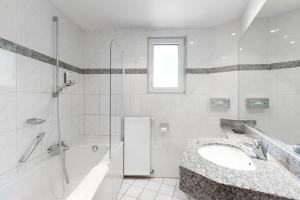 Koupelna v ubytování Hotel Wegener + 5 fotografií