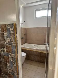 Un baño de CazaTara - Modern Villa with Pool in Alaminos