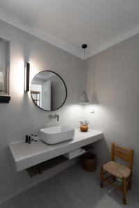A bathroom at Rizes Villas Santorini with private pool