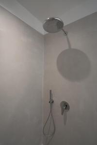 A bathroom at Rizes Villas Santorini with private pool