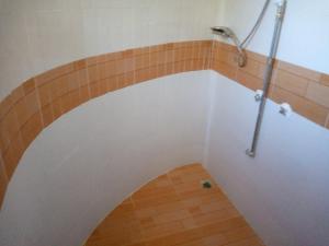 Koupelna v ubytování Esam Homestay + 29 fotografií
