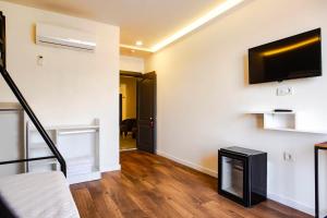 TV a/nebo společenská místnost v ubytování Belsun Hotel