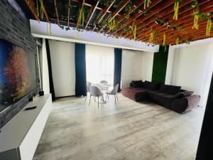 Posedenie v ubytovaní The Garden Apartment