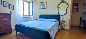 Postel nebo postele na pokoji v ubytování Villa Ninfea wonderful garden, business & relax