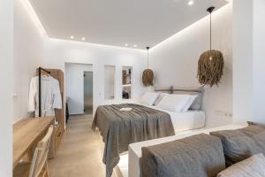 Postel nebo postele na pokoji v ubytování Cactus suite