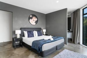 Postel nebo postele na pokoji v ubytování Modern Alpine Living with Spectacular View