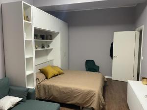 Ένα ή περισσότερα κρεβάτια σε δωμάτιο στο DaMaky