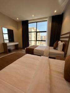 Letto o letti in una camera di نمو الديار