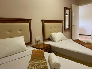 Ένα ή περισσότερα κρεβάτια σε δωμάτιο στο Hotel Suite & Apartment at PD Tiara Bay Apartment +30 φωτογραφίες