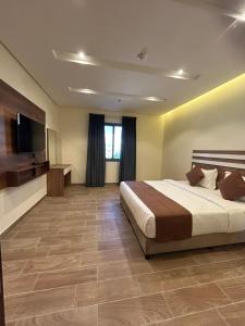 Letto o letti in una camera di نمو الديار