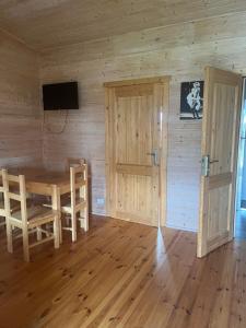 TV a/nebo společenská místnost v ubytování Domki Monika
