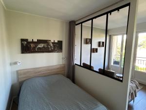 Postel nebo postele na pokoji v ubytování Appartement Talant