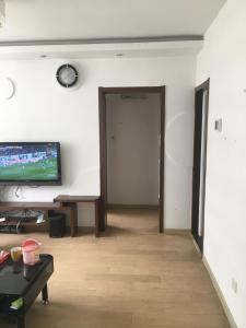 TV o dispositivi per l'intrattenimento presso Yailon House - TieXinQiao Metro St-ation - NanJing South Railway St-ation - 雅伦之屋-铁心桥地铁站-火车南站店