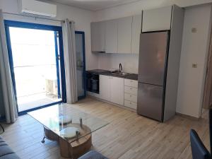 Η κουζίνα ή μικρή κουζίνα στο Aegean Apartments Evia